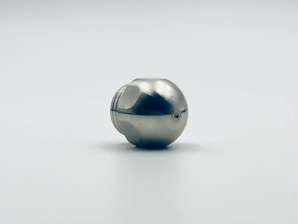 Detailed close up of flow path geometry inside Bullet Mini Nozzle ensuring consistent fluid delivery optimized across various manufacturing and process industry tasks